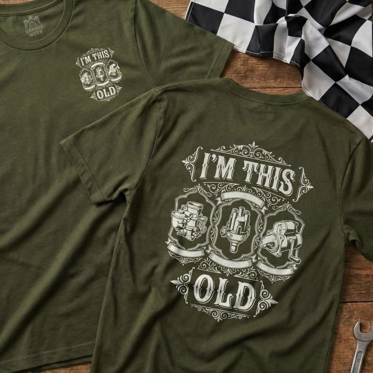 Olive green t-shirt with "I'm This Old" and vintage engine parts graphic.