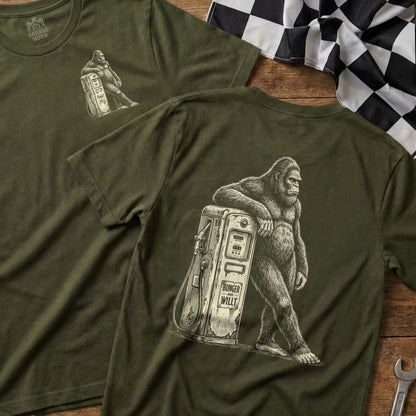 Green t-shirt with Bigfoot leaning on a vintage gas pump.