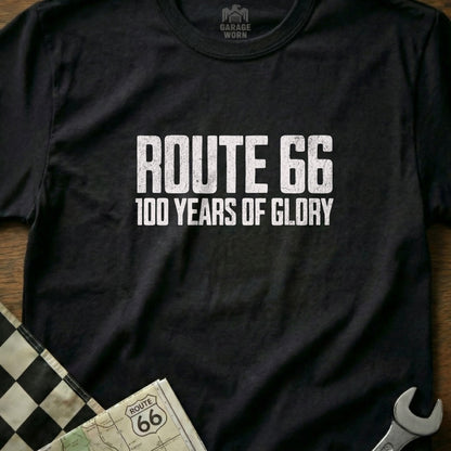 Black t-shirt with "Route 66 100 Years of Glory" text, featuring checkered flag and map.