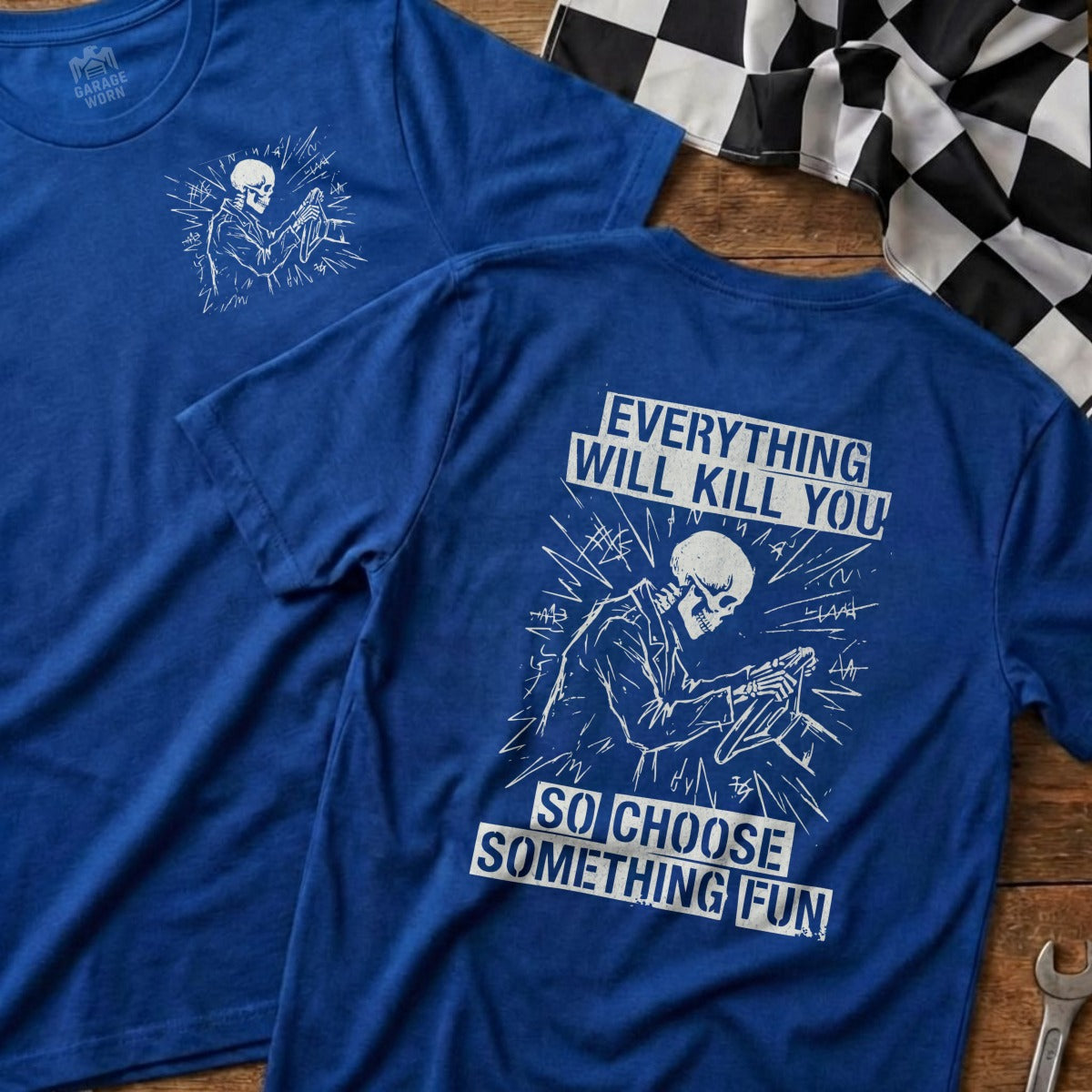 Blue t-shirt with skeleton driving and text "Everything will kill you so choose something fun."