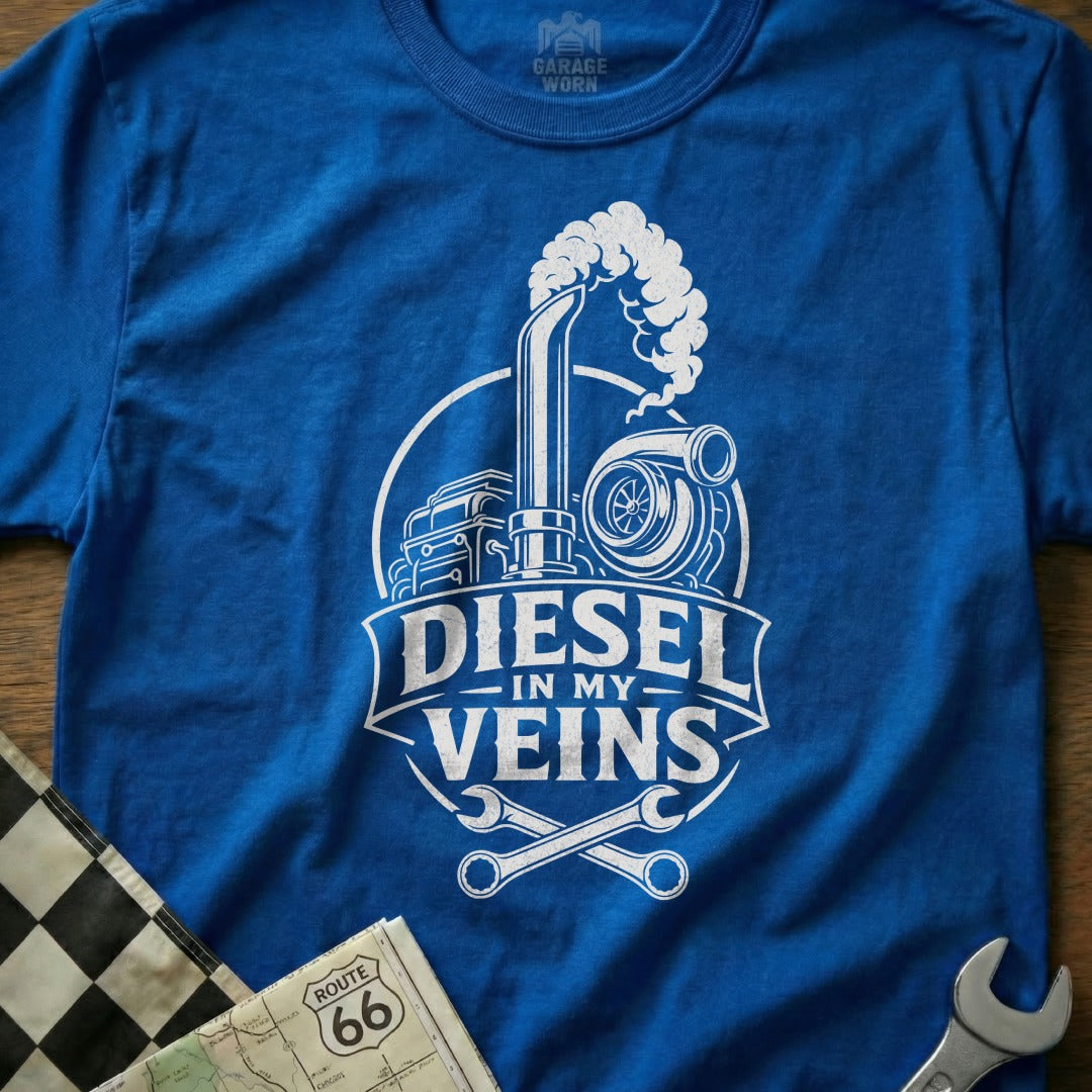 Blue t-shirt with white graphic: "Diesel In My Veins," truck, turbo, and wrenches.