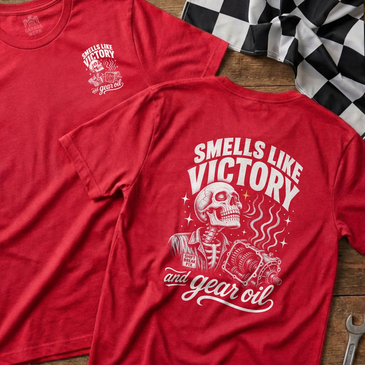 Red t-shirts with "Smells Like Victory and Gear Oil" graphic featuring a skeleton holding car parts.