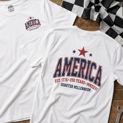 White t-shirts with "America Quarter Millennium" text and patriotic graphics.