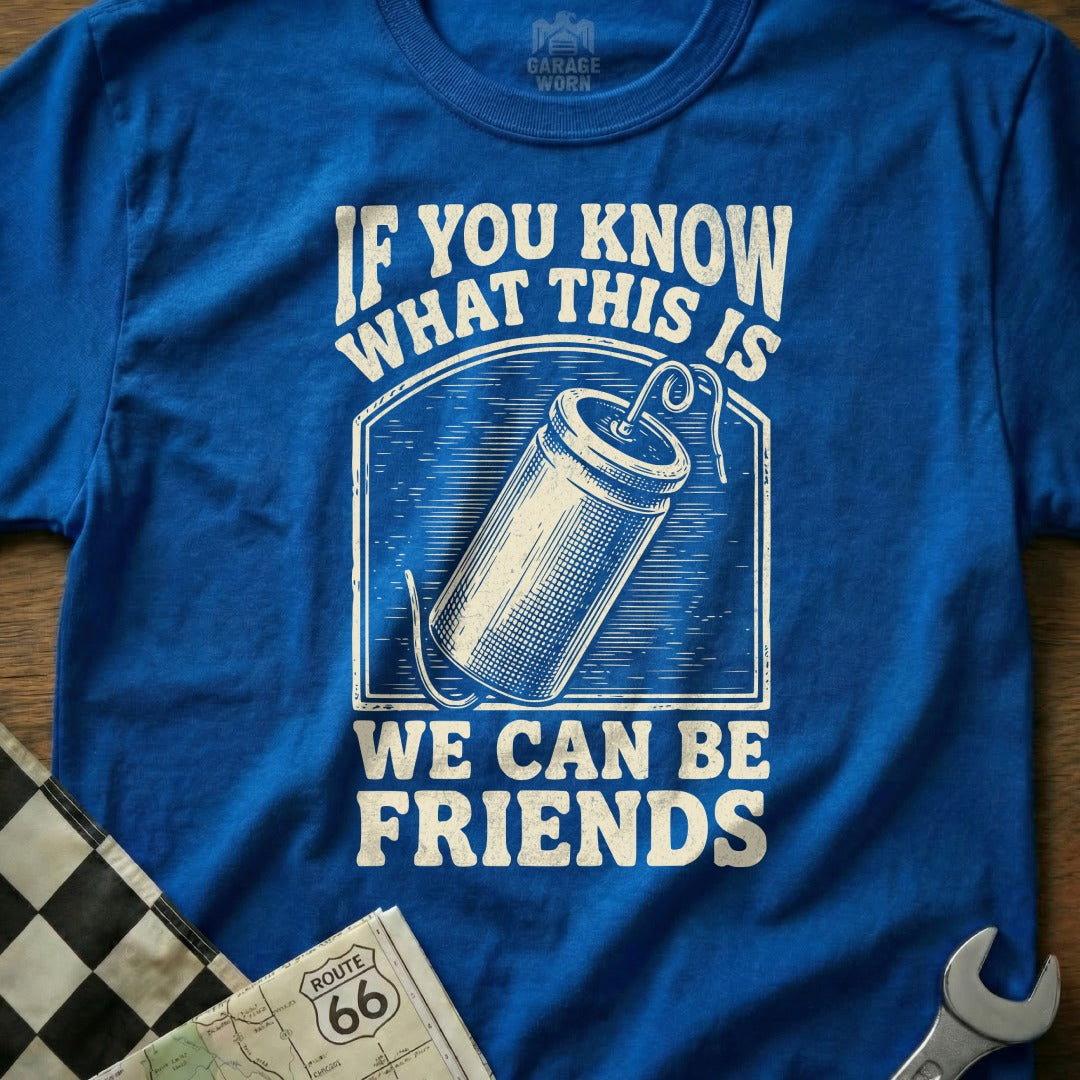 Blue t-shirt with "If You Know What This Is We Can Be Friends" and a drawing of a battery.