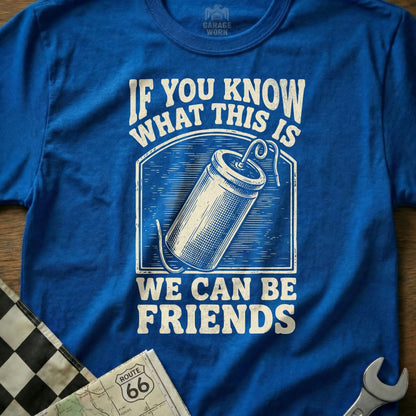 Blue t-shirt with "If You Know What This Is We Can Be Friends" and a drawing of a battery.