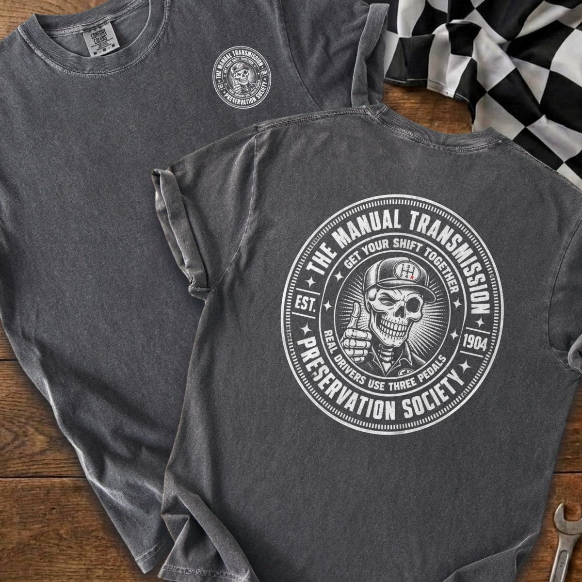 Gray t-shirt with skull logo: "The Manual Transmission Preservation Society."
