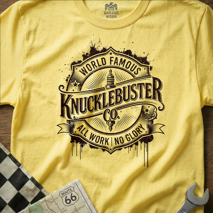 Yellow t-shirt with "World Famous Knucklebuster Co. All Work No Glory" logo and Route 66 map.
