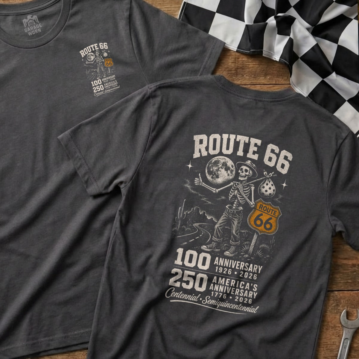 Dark gray t-shirt with skeleton hitchhiking graphic for Route 66 100th anniversary.
