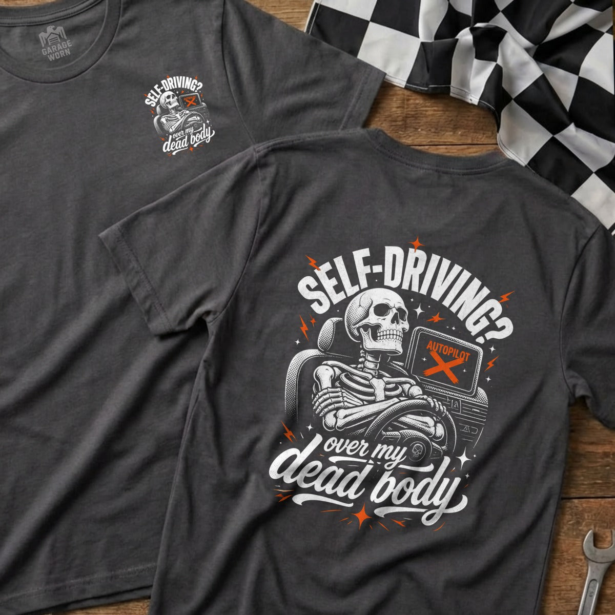 Dark gray t-shirt with skeleton driving, "Self-driving? Over my dead body" text.
