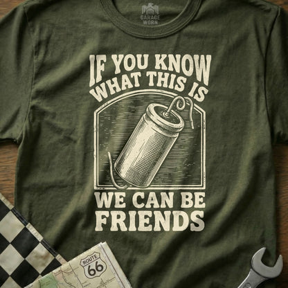 Olive t-shirt with dynamite stick graphic and "If you know what this is, we can be friends" text.