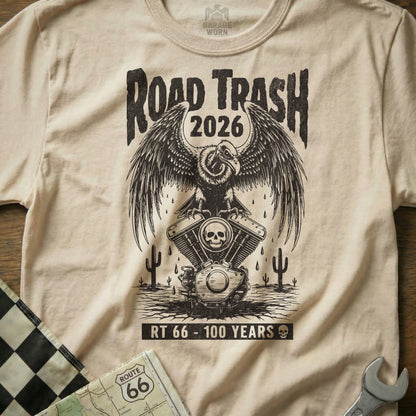 Cream t-shirt with "Road Trash 2026" and eagle on motorcycle engine.