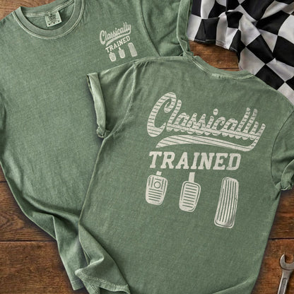 Green t-shirt with "Classically TRAINED" and three-pedal graphic.