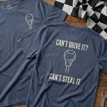 Blue t-shirt with gear shift graphic and text: Can't Drive It? Can't Steal It.
