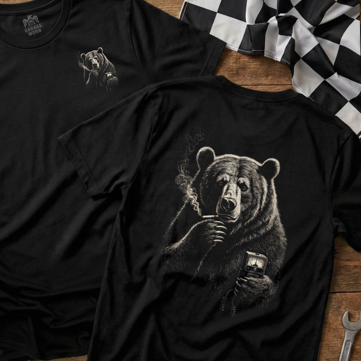 Black t-shirt with a drawing of a bear smoking and holding a meter.