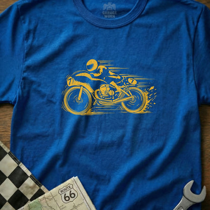 Yellow motorcycle racer graphic on a blue t-shirt, with checkered flag and map.