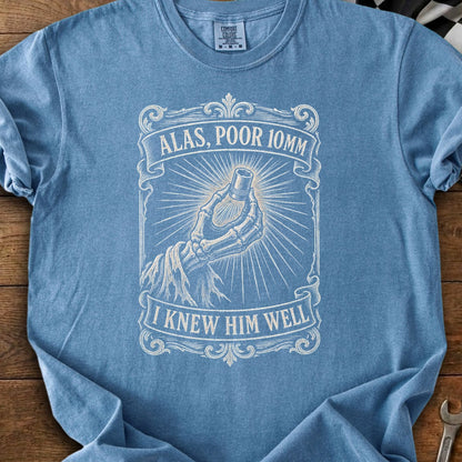 Blue t-shirt with skeleton hand holding a socket and text "Alas, Poor 10mm. I Knew Him Well."