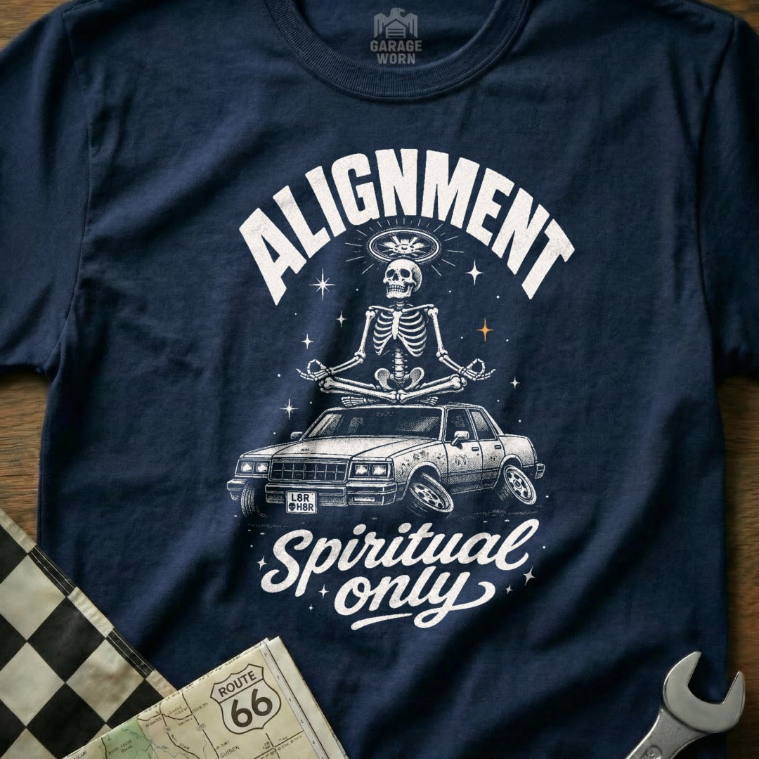 Navy t-shirt with skeleton meditating on a car, "ALIGNMENT Spiritual only" text.