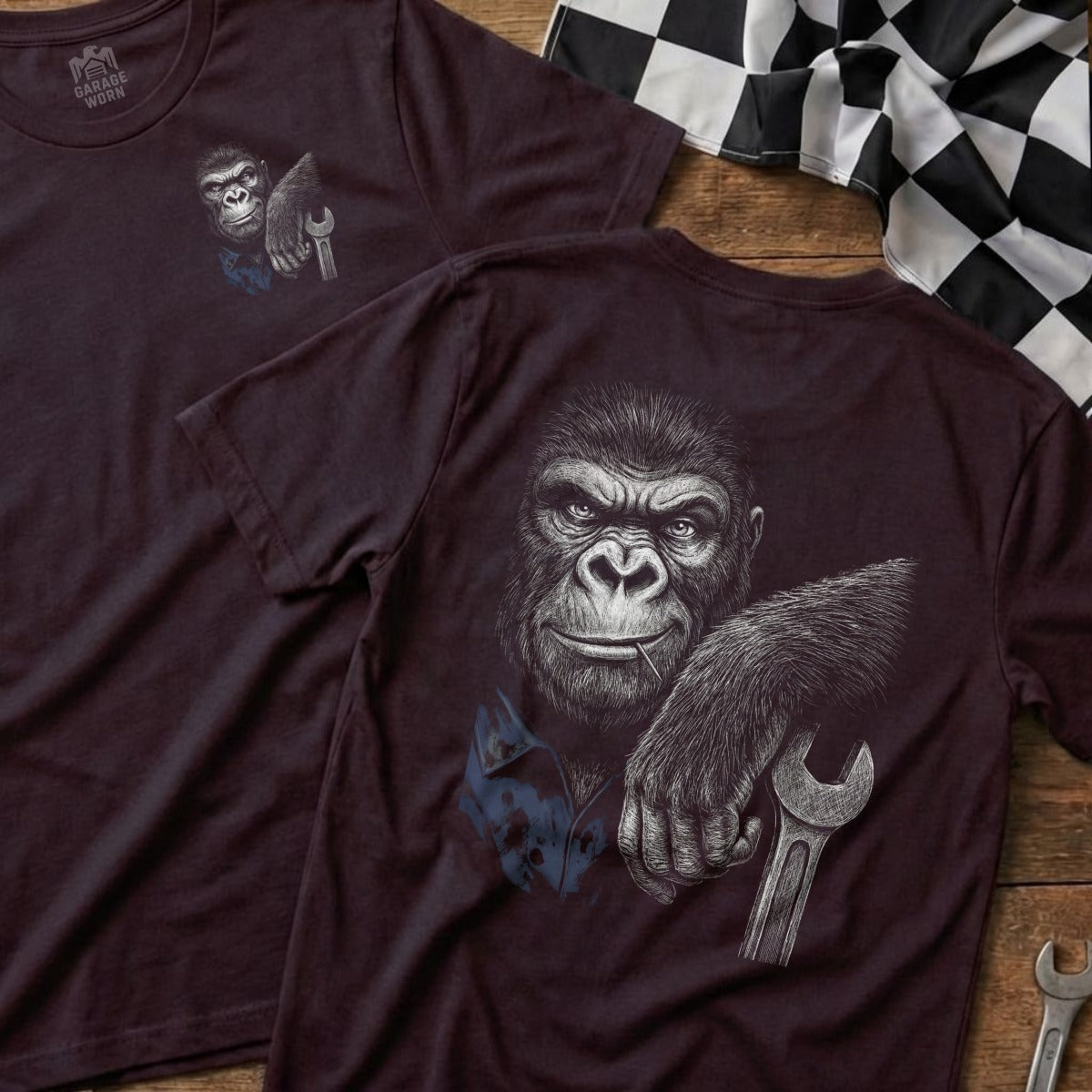 Gorilla with wrench graphic on a maroon t-shirt.