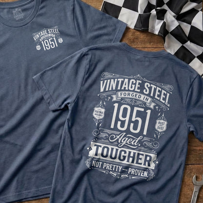 Blue t-shirt with "Vintage Steel 1951 Aged. Tougher." text and "Garage Worn" logo.