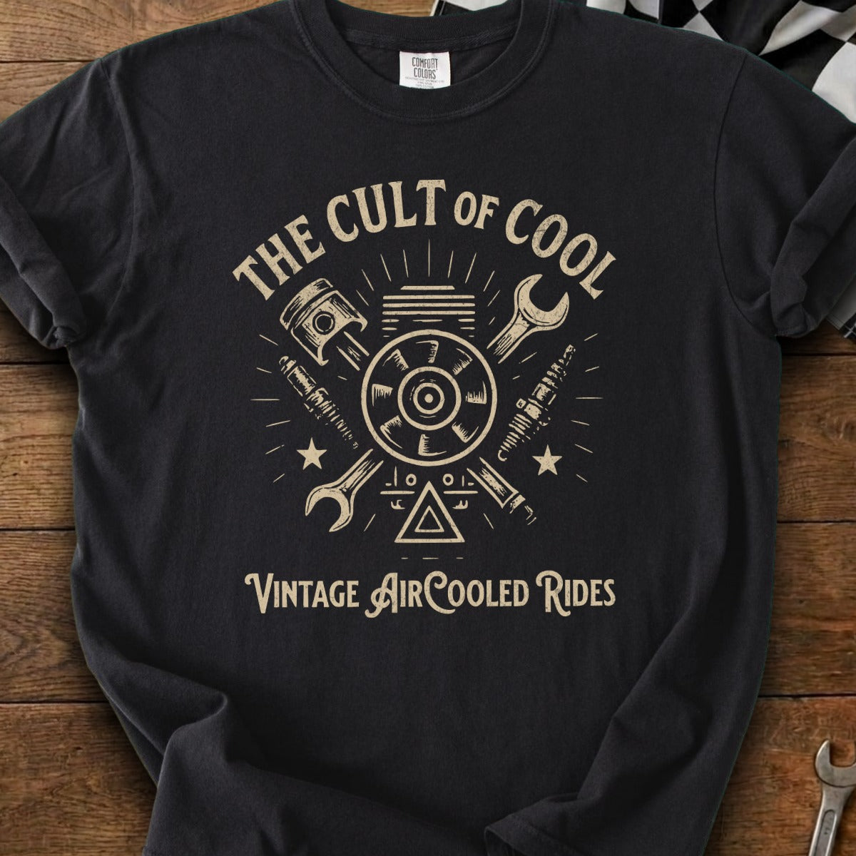 Black t-shirt with "The Cult of Cool Vintage Air-Cooled Rides" text and engine parts graphic.