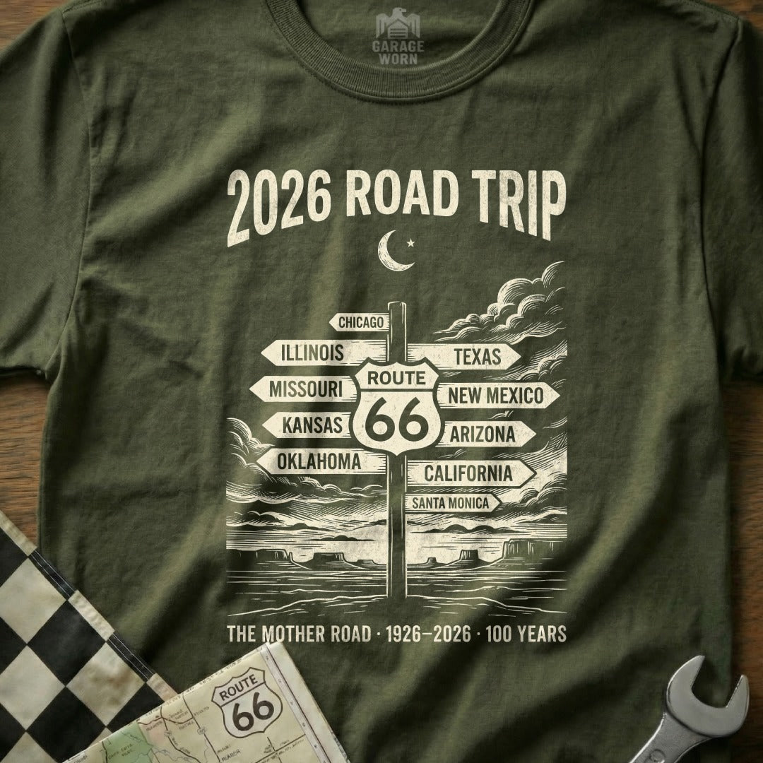 Green t-shirt with "2026 Road Trip" and Route 66 signpost graphic.