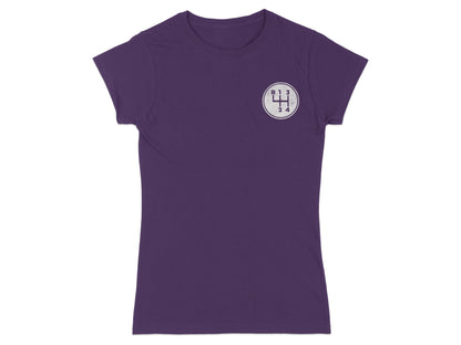 Purple t-shirt with a white circle graphic of a manual gear shift pattern.