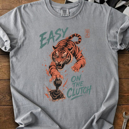 Tiger on a gear shift with text "EASY ON THE CLUTCH"