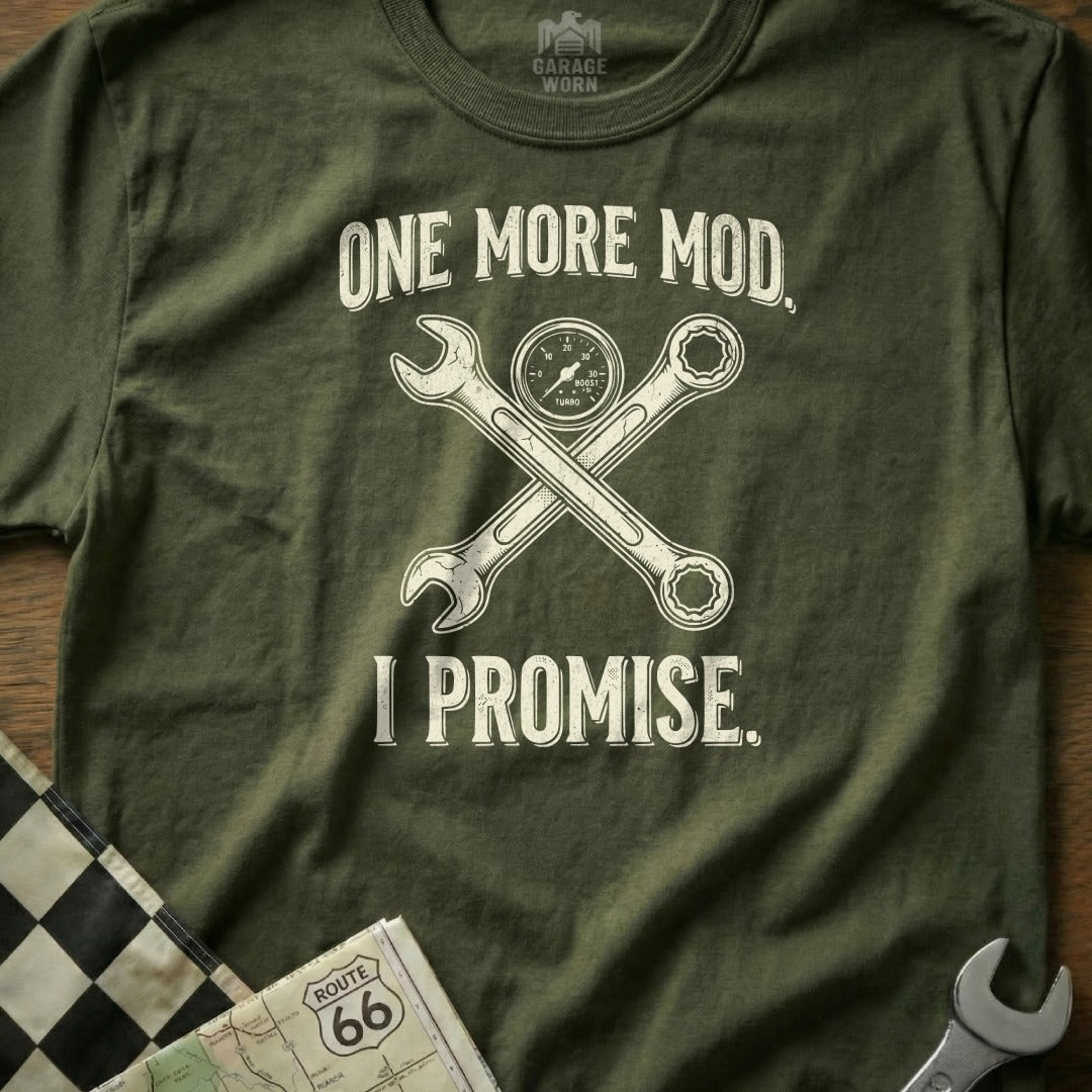 Green t-shirt with crossed wrenches and "One More Mod, I Promise" text.