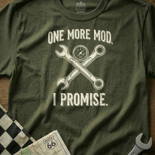 Green t-shirt with crossed wrenches and "One More Mod, I Promise" text.