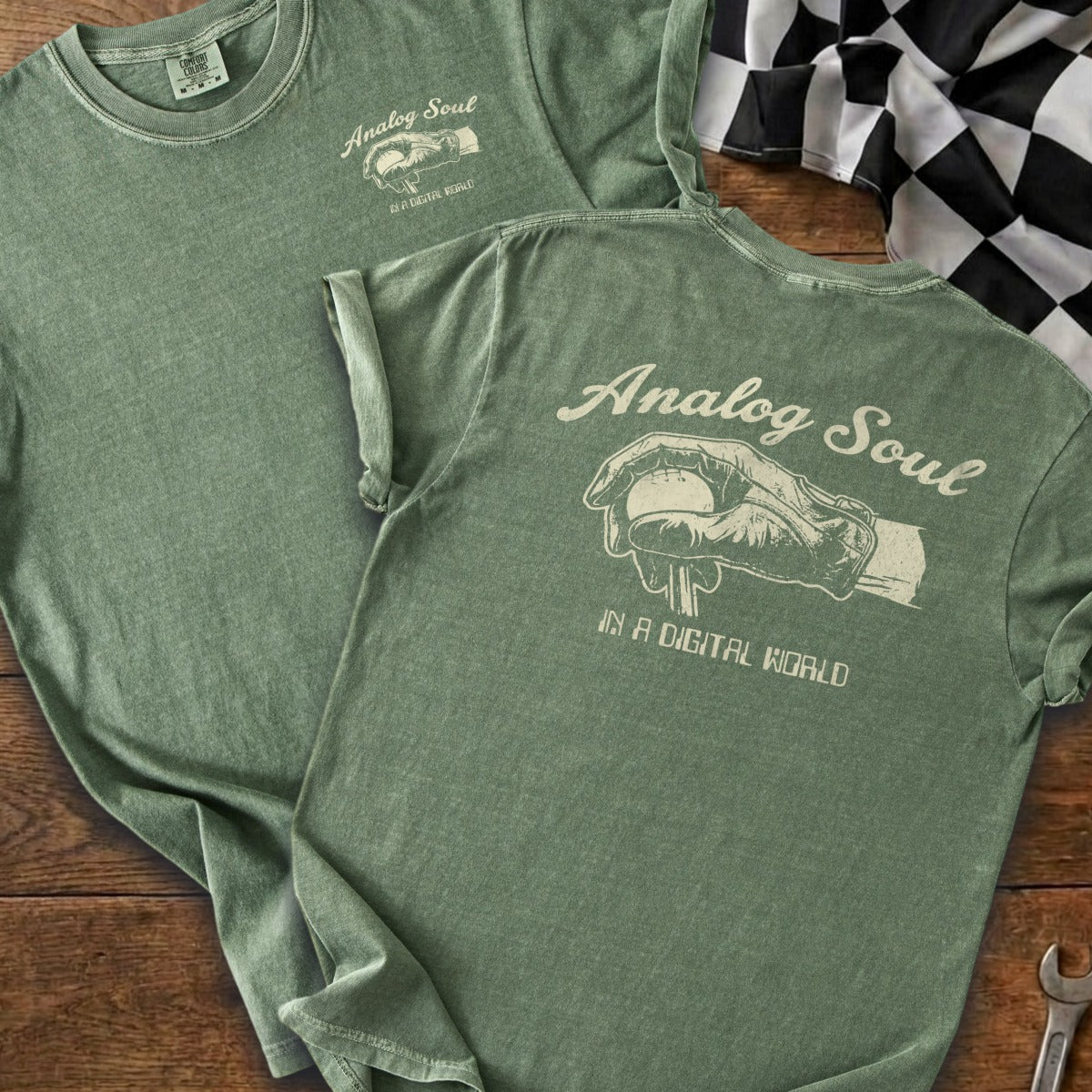 Green t-shirt with "Analog Soul" graphic and a checkered flag.