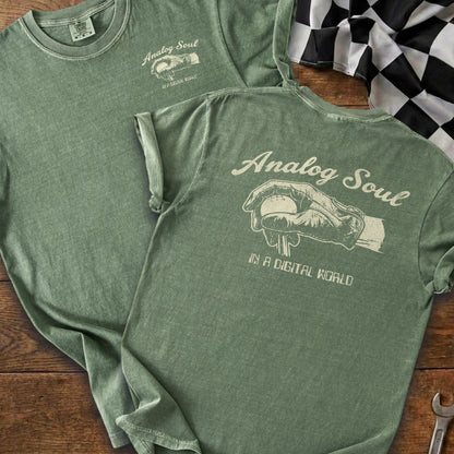 Green t-shirt with "Analog Soul" graphic and a checkered flag.