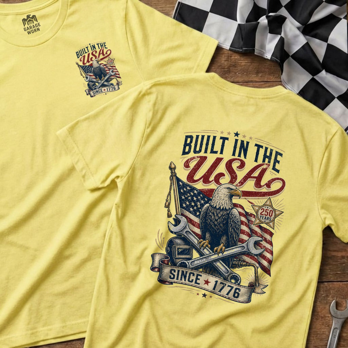 Yellow t-shirt with "Built in the USA Since 1776" graphic and eagle.