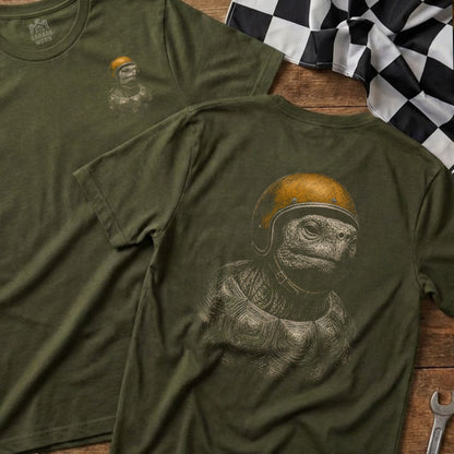 Olive green t-shirt with tortoise wearing a helmet graphic on the back.