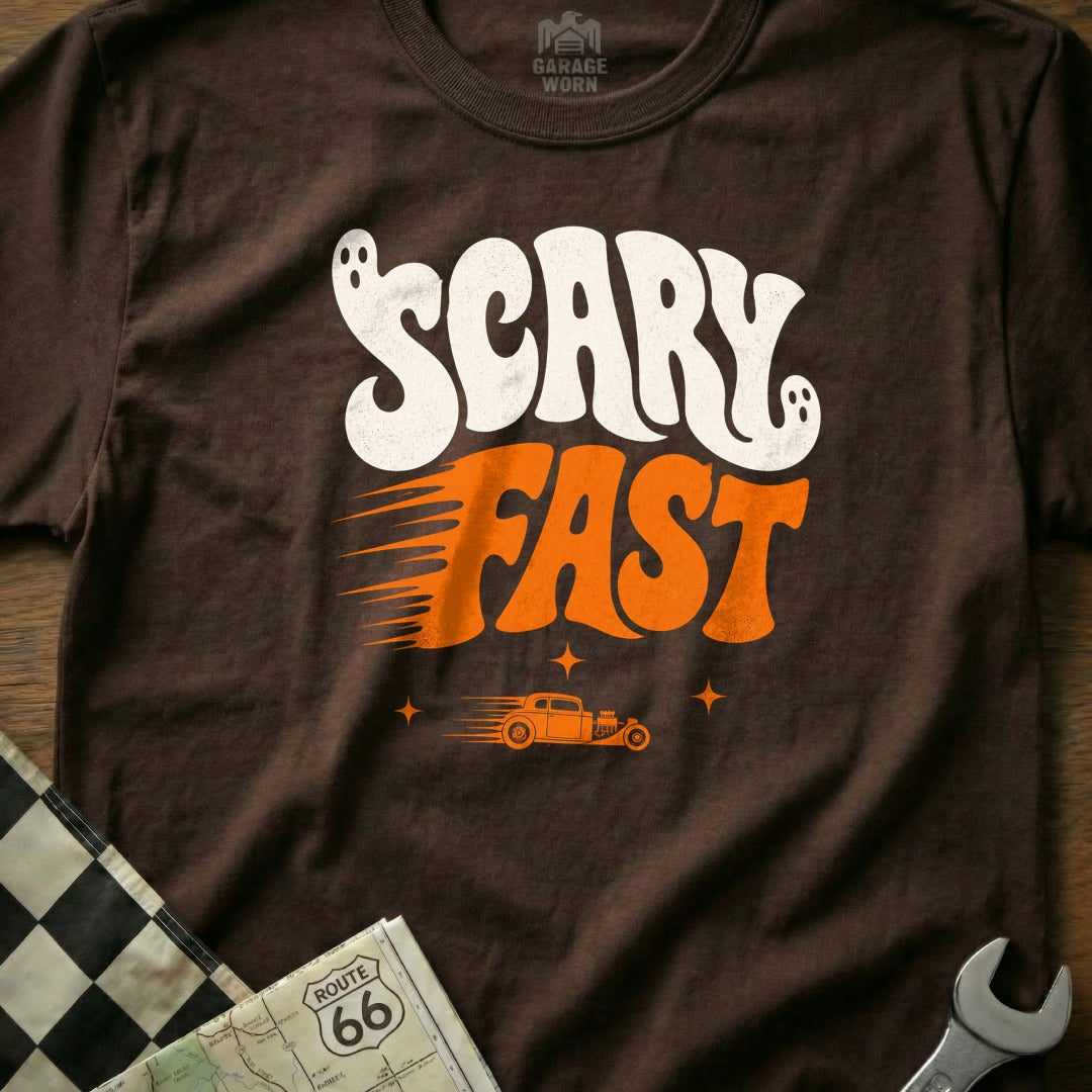 Brown t-shirt with white ghost "Scary" and orange "Fast" text.