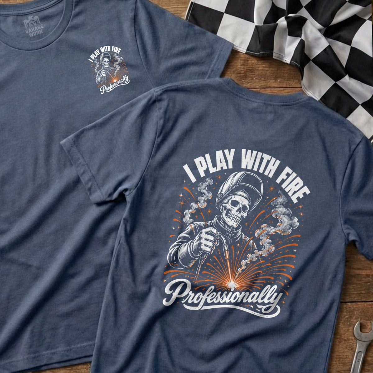T-shirt with skeleton welder graphic and text "I PLAY WITH FIRE Professionally".