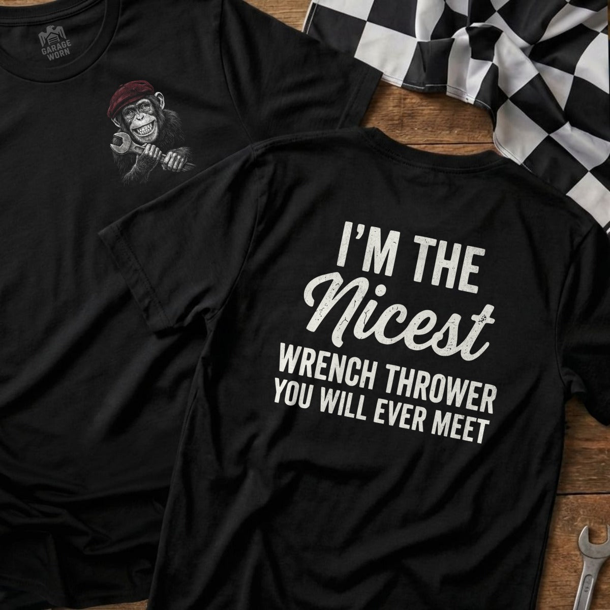 Black t-shirt with "I'm the Nicest Wrench Thrower You Will Ever Meet" text.