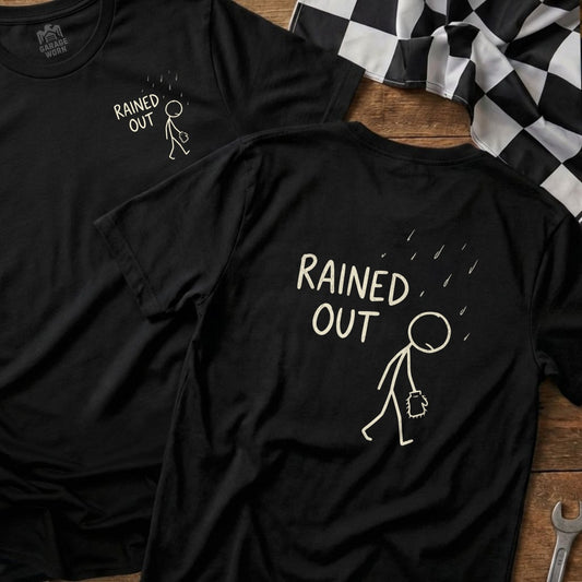 Black t-shirt with "RAINED OUT" and a stick figure under falling rain.