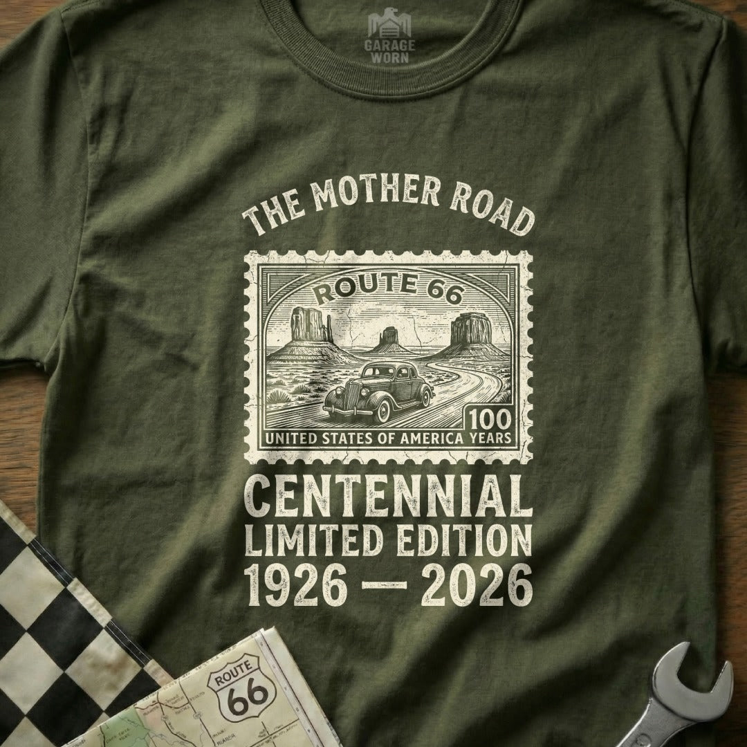 Olive green t-shirt with Route 66 Centennial design and postage stamp graphic.