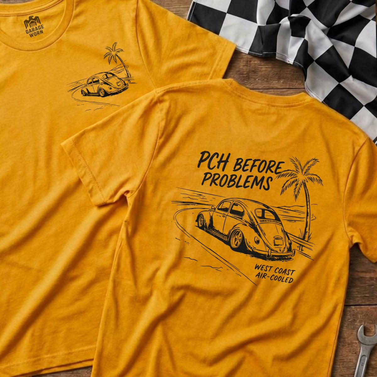 Orange t-shirt with vintage car, palm trees, and "PCH BEFORE PROBLEMS" text.