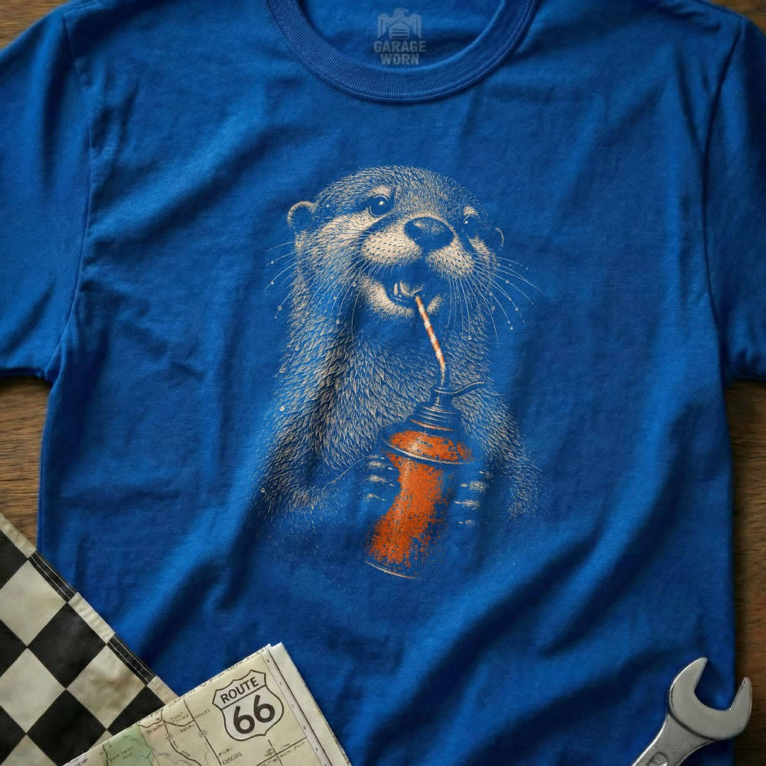 Blue t-shirt with an otter drinking from an oil can graphic and a Route 66 map.