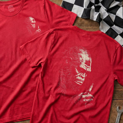 Red t-shirt with a detailed drawing of a gorilla holding a spark plug.
