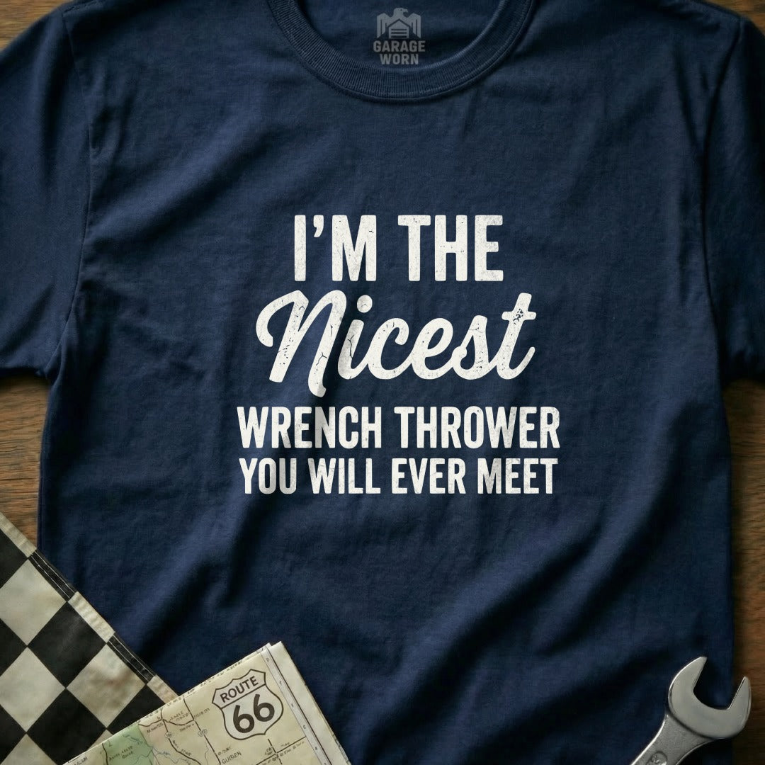 Navy t-shirt with "I'm The Nicest Wrench Thrower You Will Ever Meet" text.