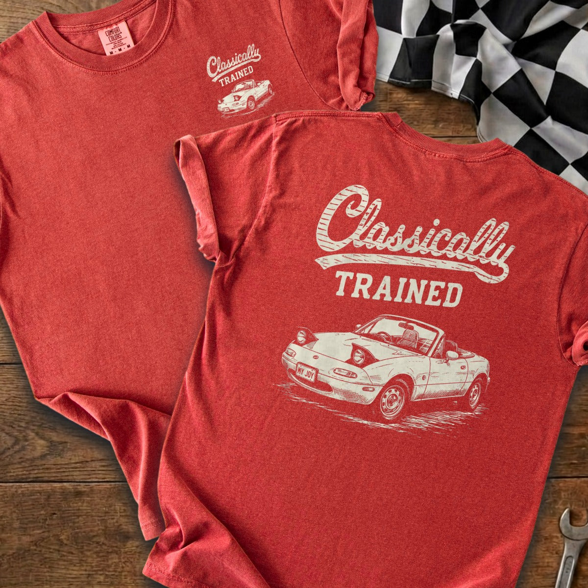 Red t-shirt with "Classically TRAINED" and a white convertible car graphic.