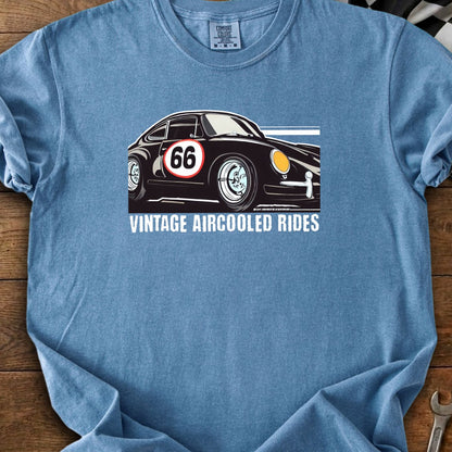 Black vintage car with number 66 on a blue t-shirt with text "Vintage Aircooler Rides".