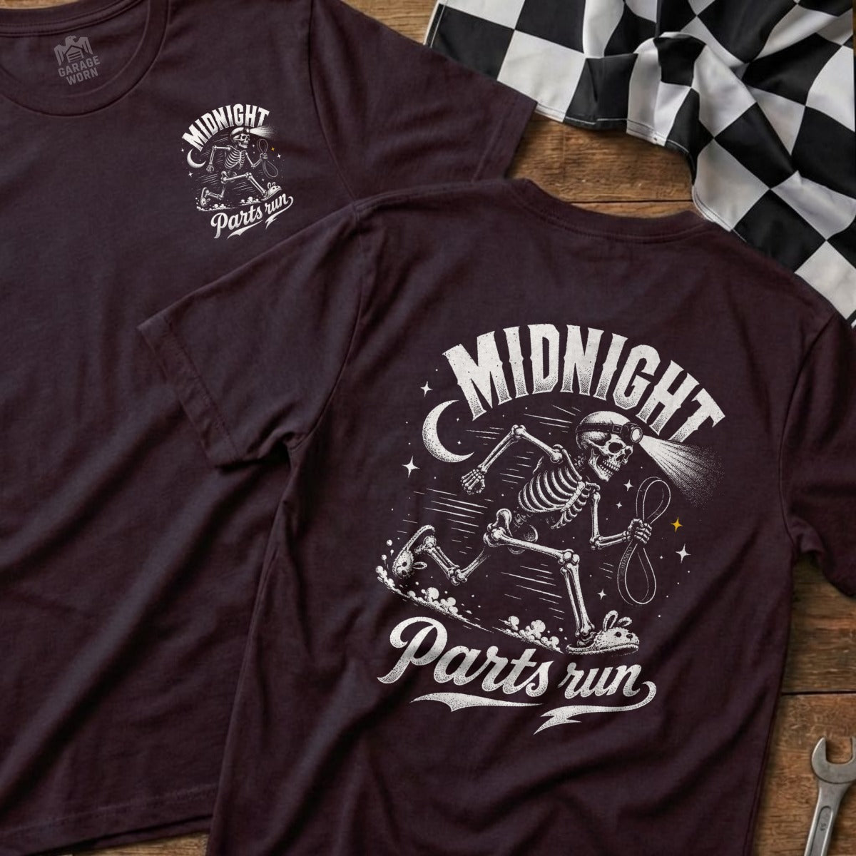 Dark graphic t-shirt with a running skeleton, moon, and text "Midnight Parts run".