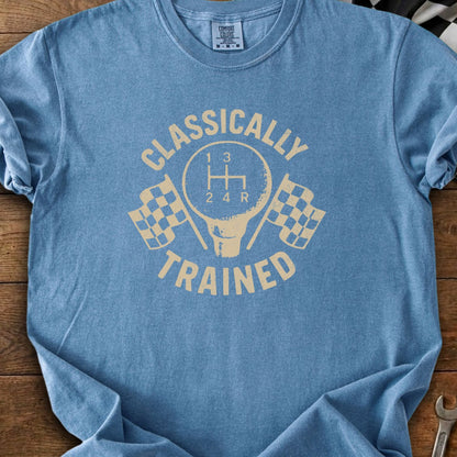 Blue t-shirt with "Classically Trained" text, gearbox, and checkered flags.