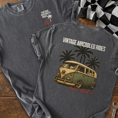 Dark gray t-shirt with vintage aircooled van and palm tree graphic.
