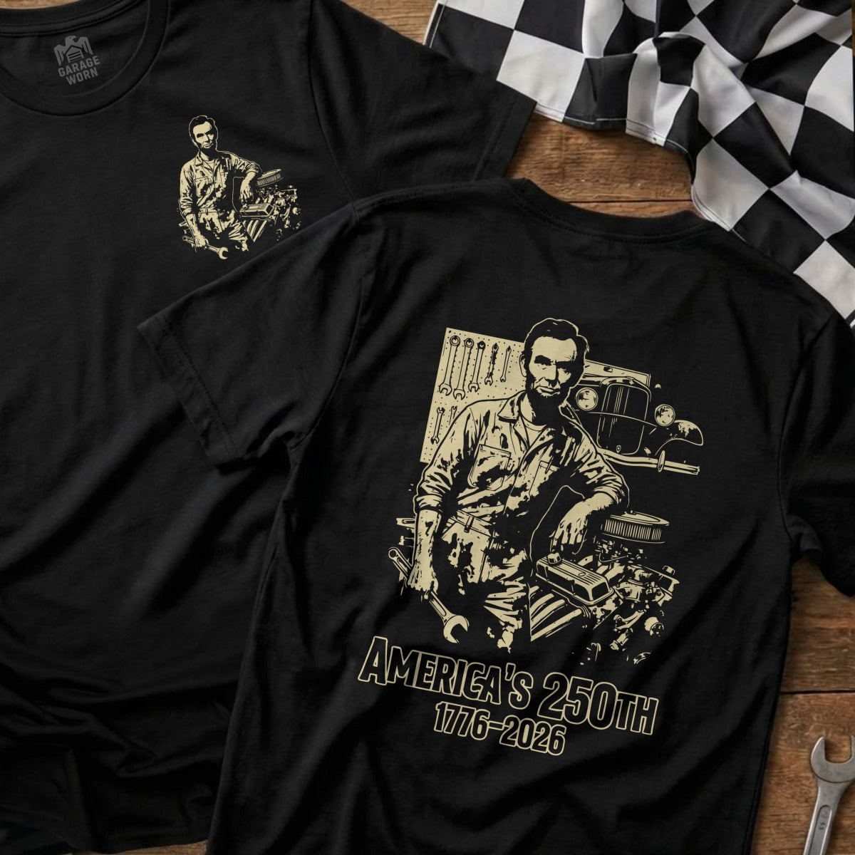 Black t-shirt with Lincoln and engine graphic, "America's 250th 1776-2026" text.