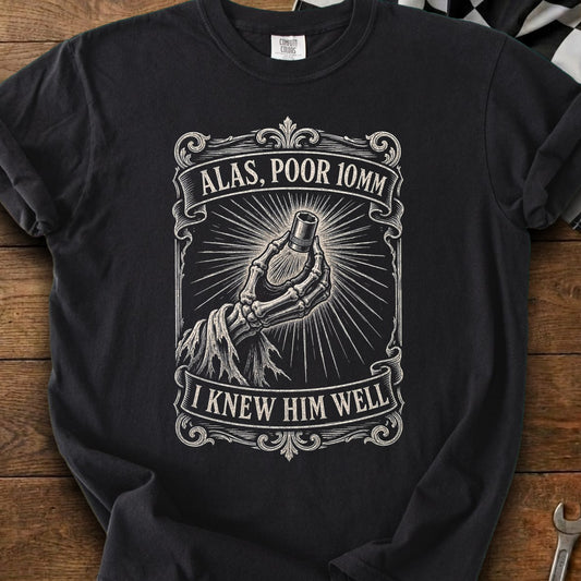 Black t-shirt with skeleton hand holding 10mm socket and text "Alas, Poor 10mm, I Knew Him Well".