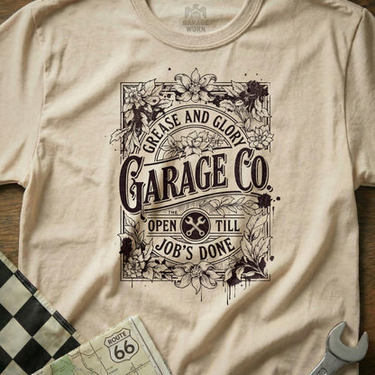 T-shirt with "Garage Co." logo, flowers, and "Grease and Glory" text.